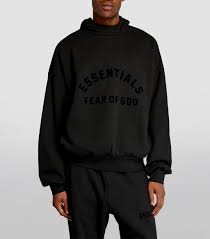 Read more about the article Essentials Hoodie: Minimalist Style, Maximum Comfort